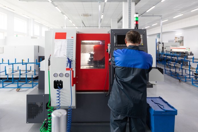 Factory worker - operator of metal processing equipment